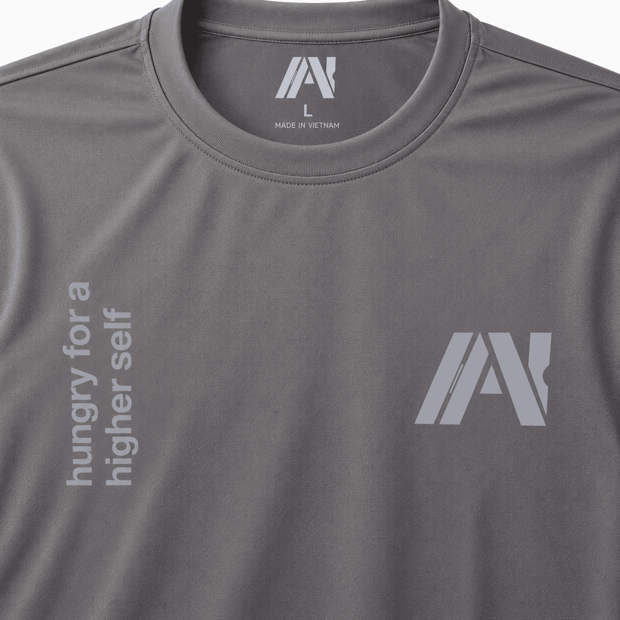 Gray AHUNGRYMAN T-Shirt — close-up of chest print and neck tag